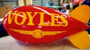 Helium Advertising Blimps - Voyle's logo